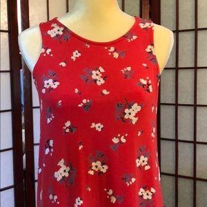 Elegant day or casual night wear, never worn! This is a muted pink with swing!